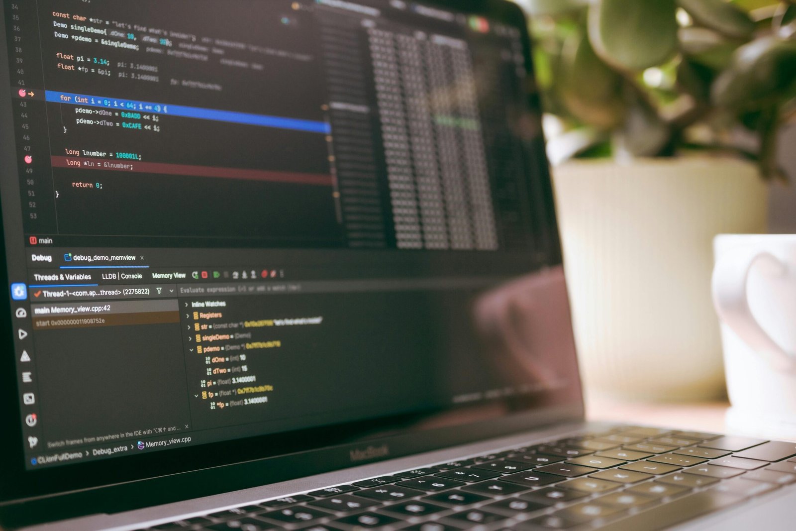 service-1 A laptop screen showing programming code and debugging tools, ideal for tech topics.